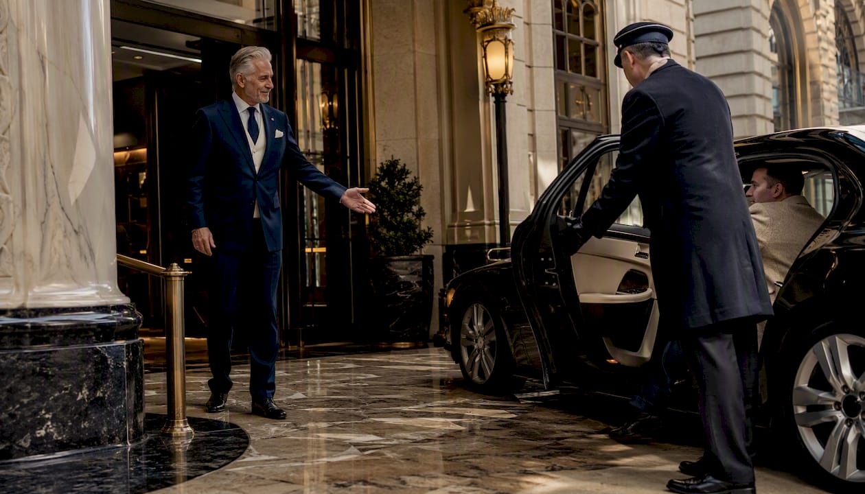 Concierge managing VIP guest arrival