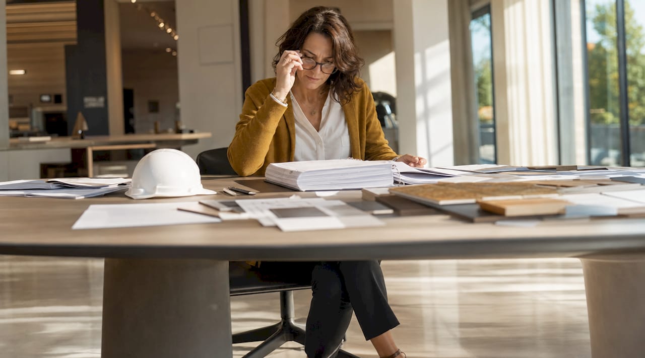 Project manager reviewing construction documents