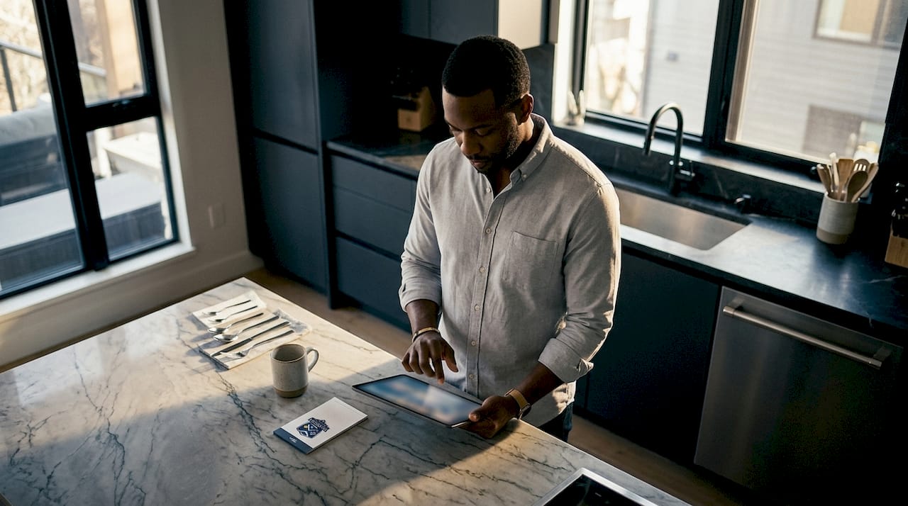 Property Watch Welcome Home Service: What You Need to Know Man uploading digital home inspection reports