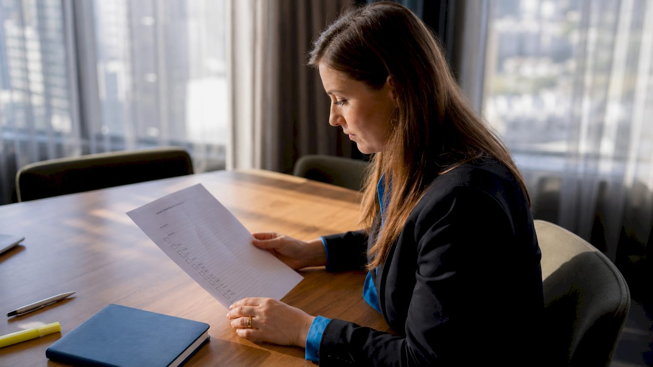 Solicitor hands holding checklist on testamentary capacity