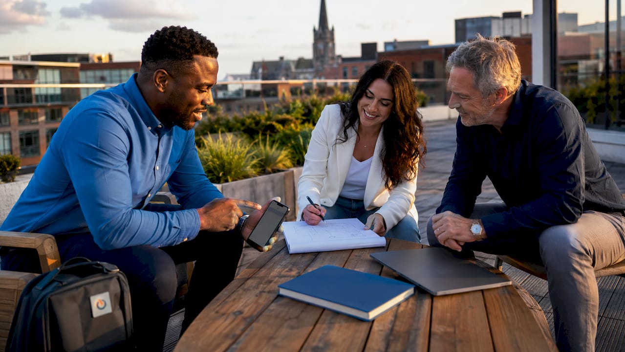 Colleagues discussing CRM integration strategy