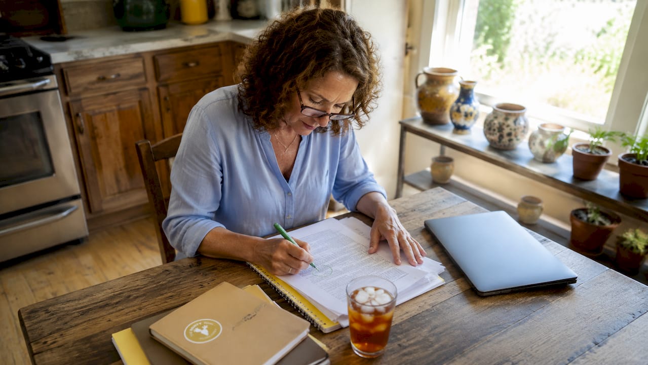 Person reviewing Sedona rental regulations at home office