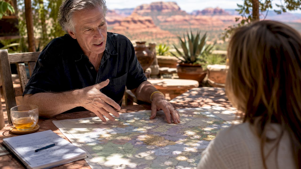 Agent pointing out Sedona neighborhood map details