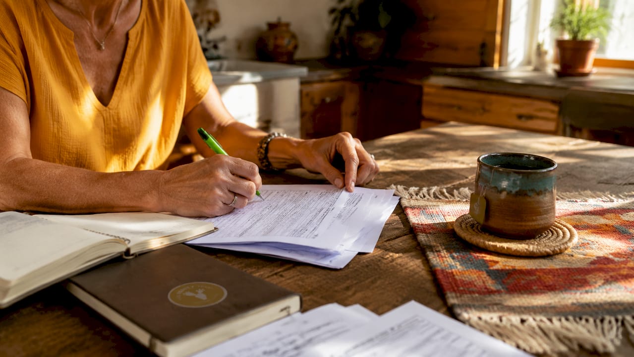 Close-up hands completing SPDS disclosure form