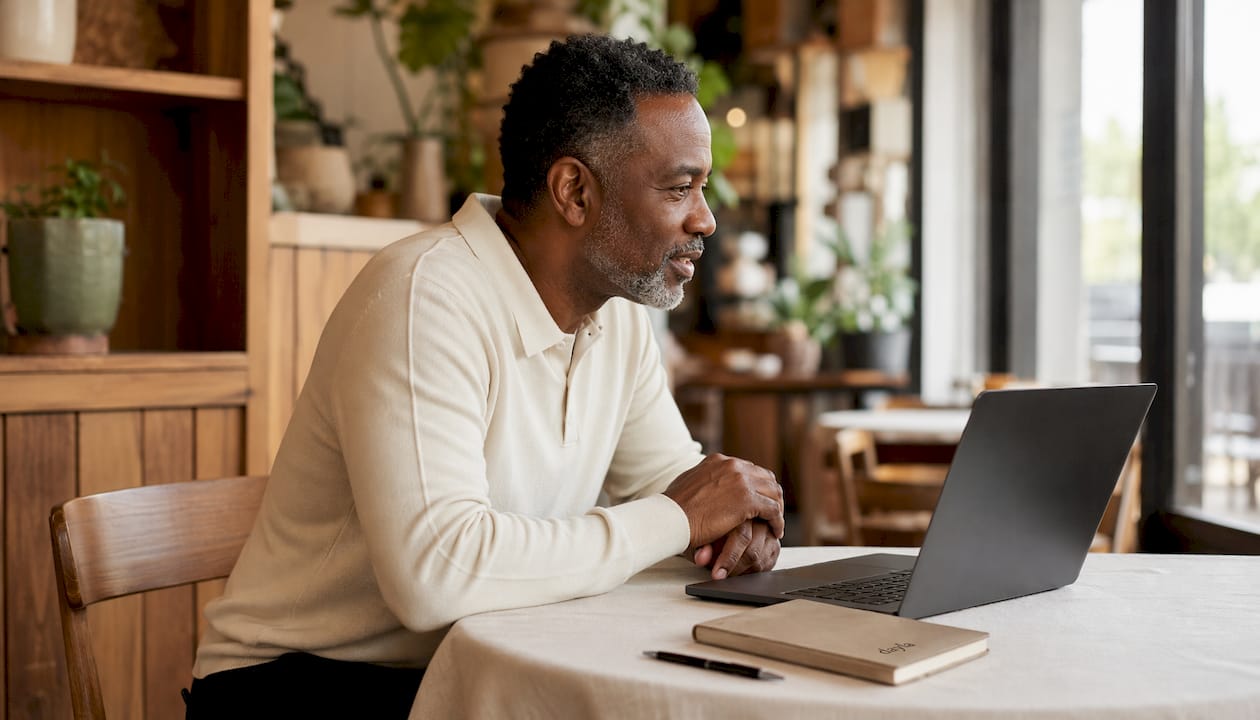 Man in home office during telehealth consultation