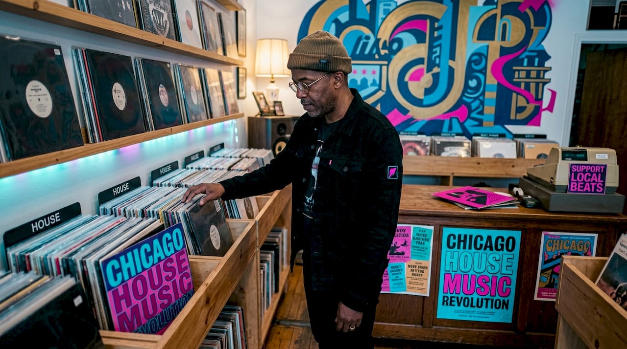 Man browsing vinyl records in Chicago record store