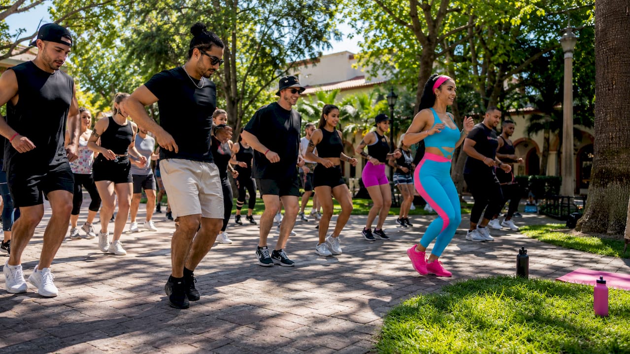 Adult students practicing Latin dance congress workshop