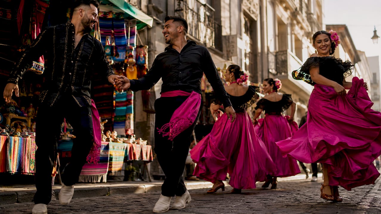 Diverse dancers at Latin cultural festival outdoors