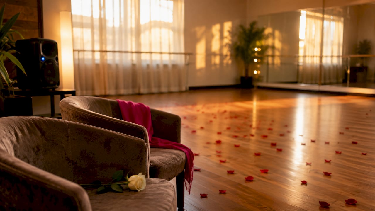 Cozy romantic dance studio with roses and dim lighting