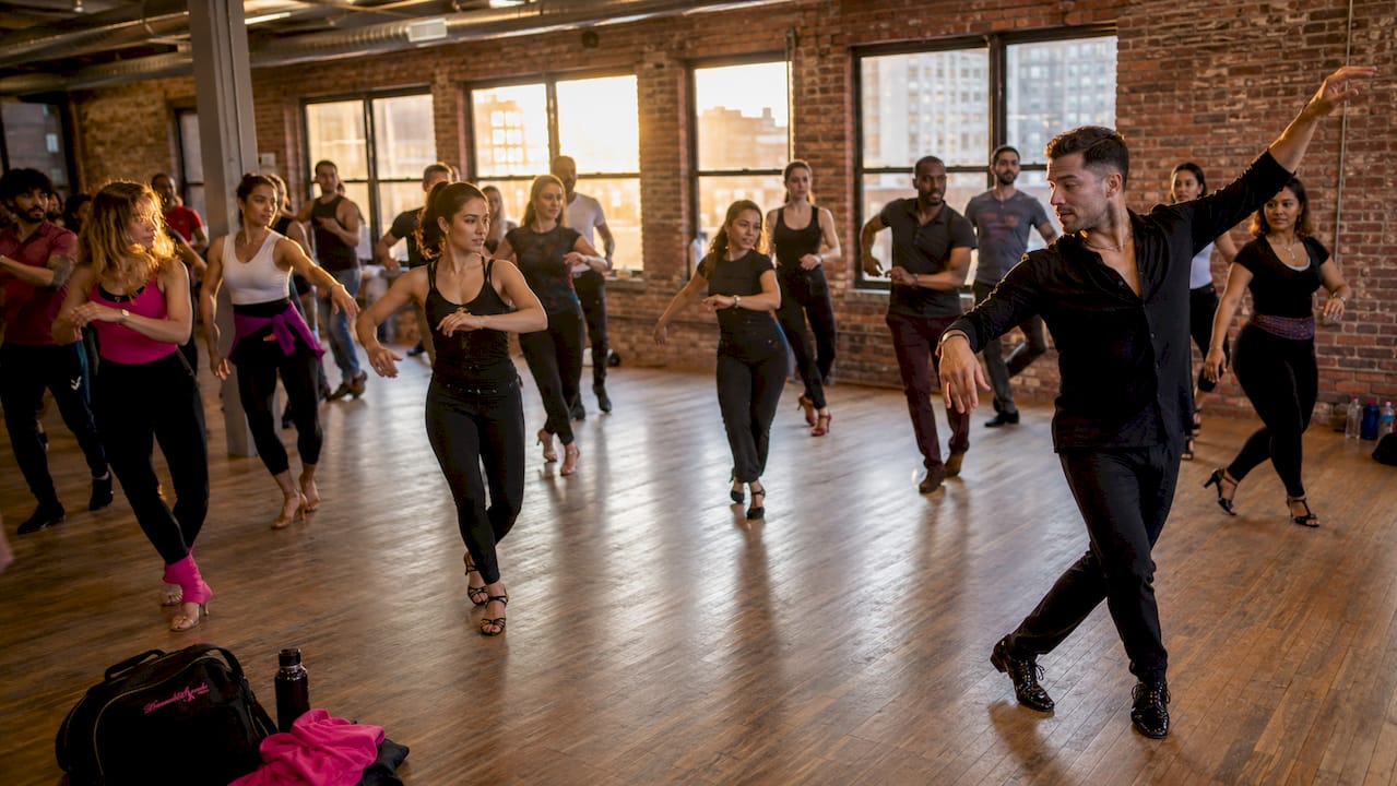 Overhead view of group bachata dance class