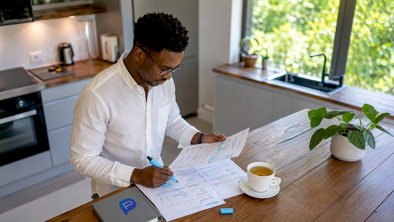 Young hiring manager reviewing candidate feedback