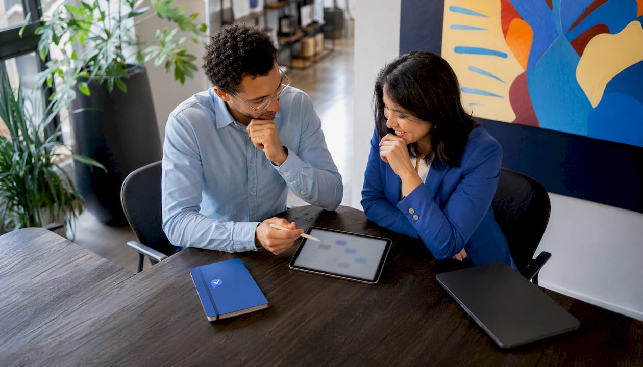 Hiring team discussing recruitment collaboration
