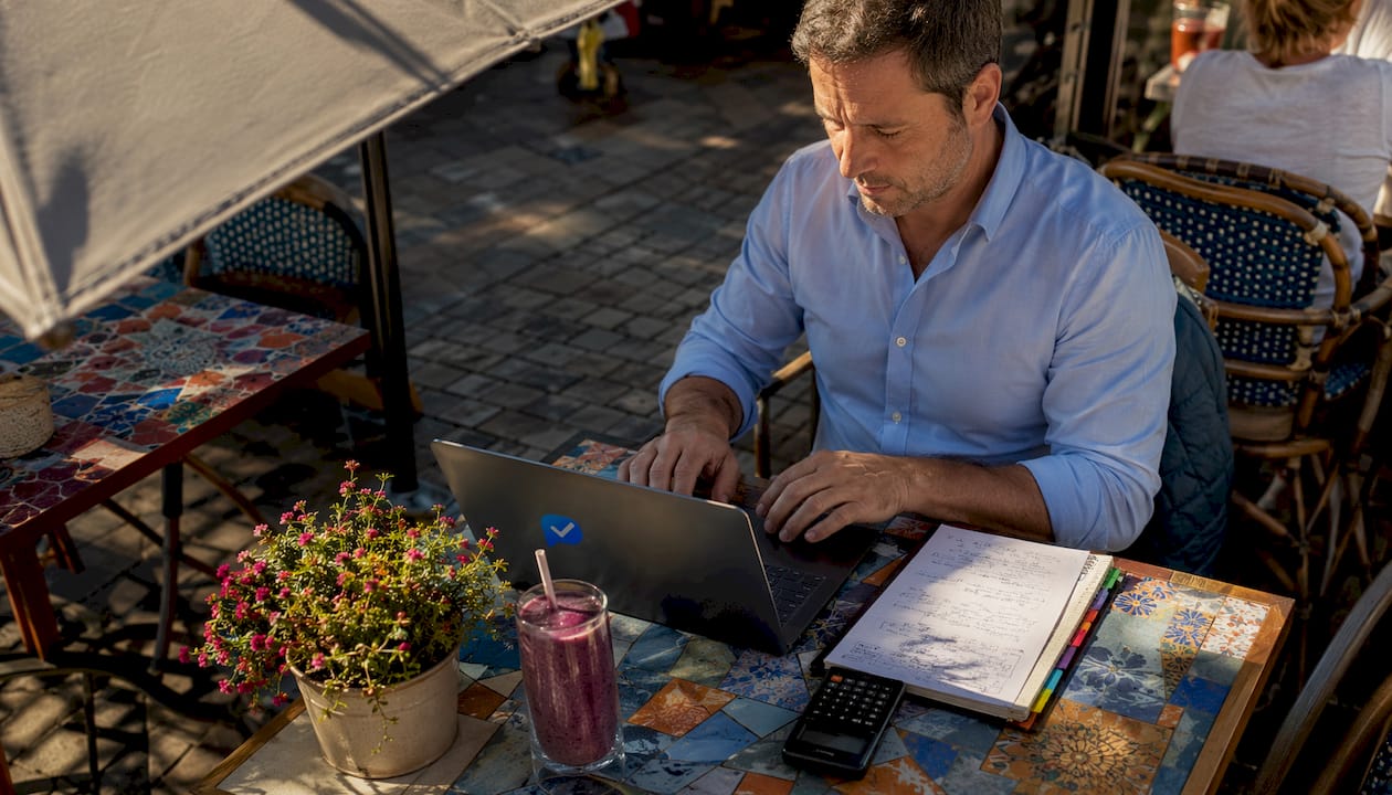 Professional taking skills knowledge test on laptop