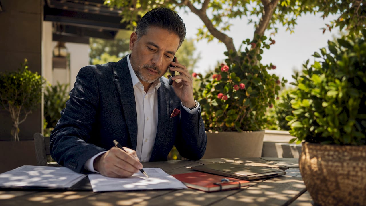 Real estate agent closing deals in office