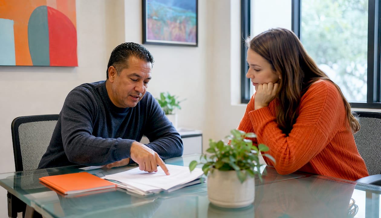 Student consulting disability services staff
