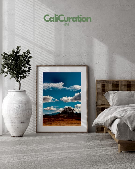 Eclectic California art wall in cozy den