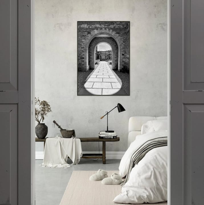 Man engaging emotionally with personal wall art