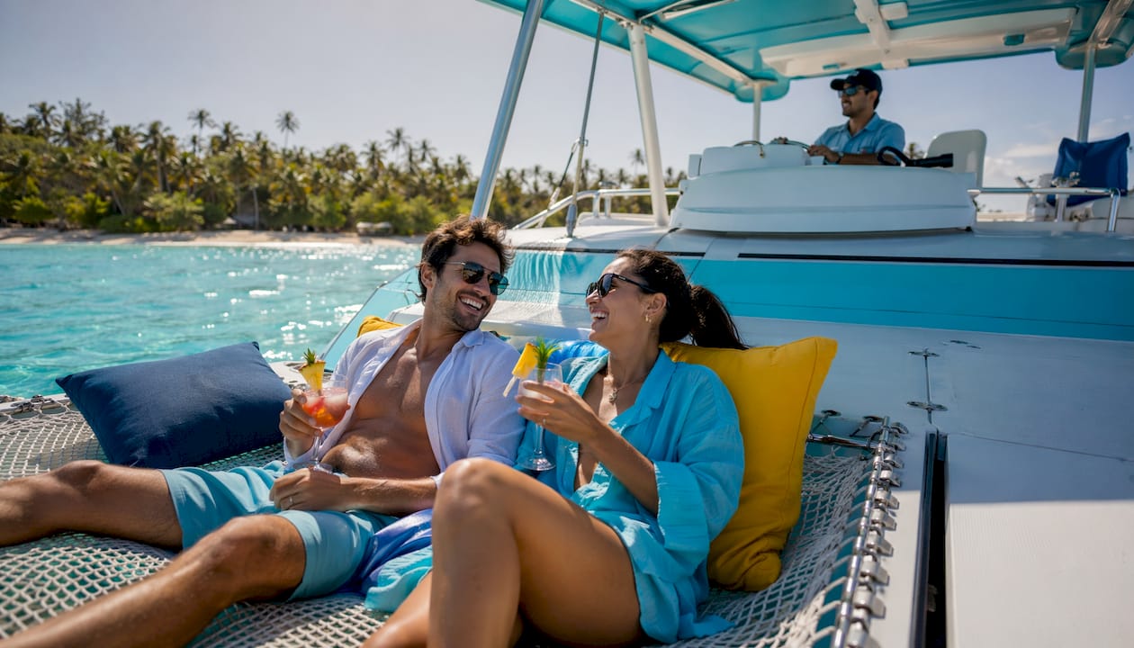 Couple enjoying private boat cruise on calm waters