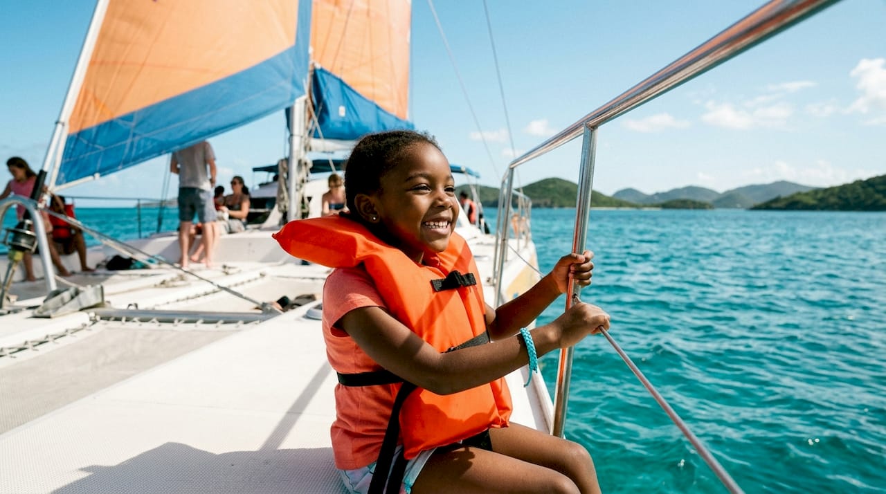 Child in life jacket on sightseeing boat