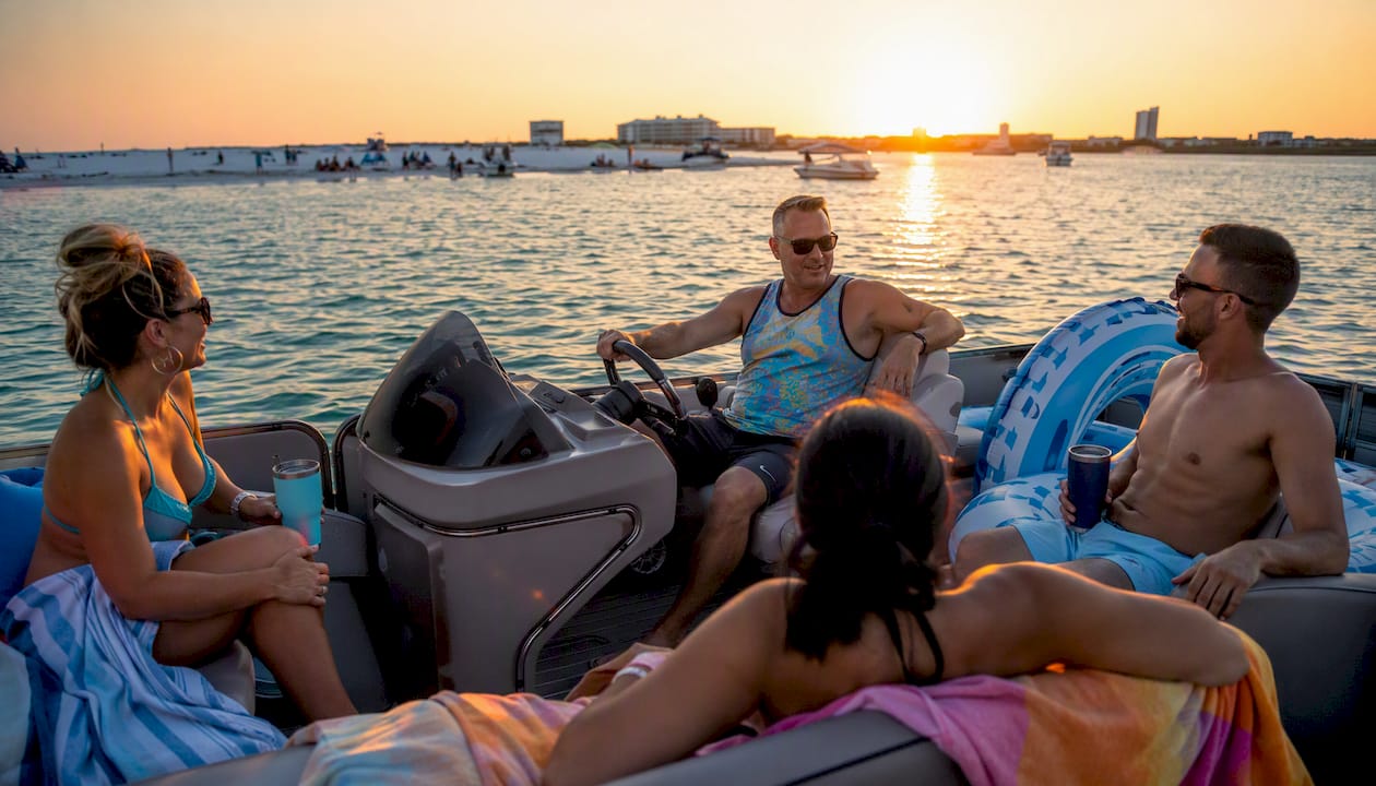 Pontoon boat cruising near Crab Island in Destin FL
