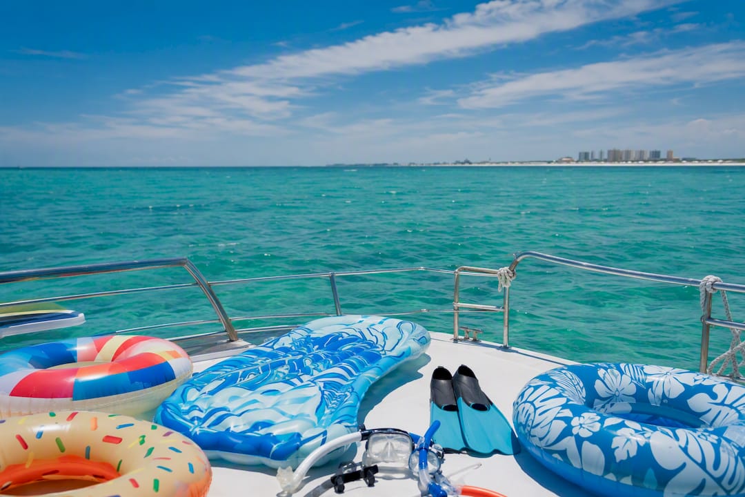 Emerald green Gulf water and boat deck in summer