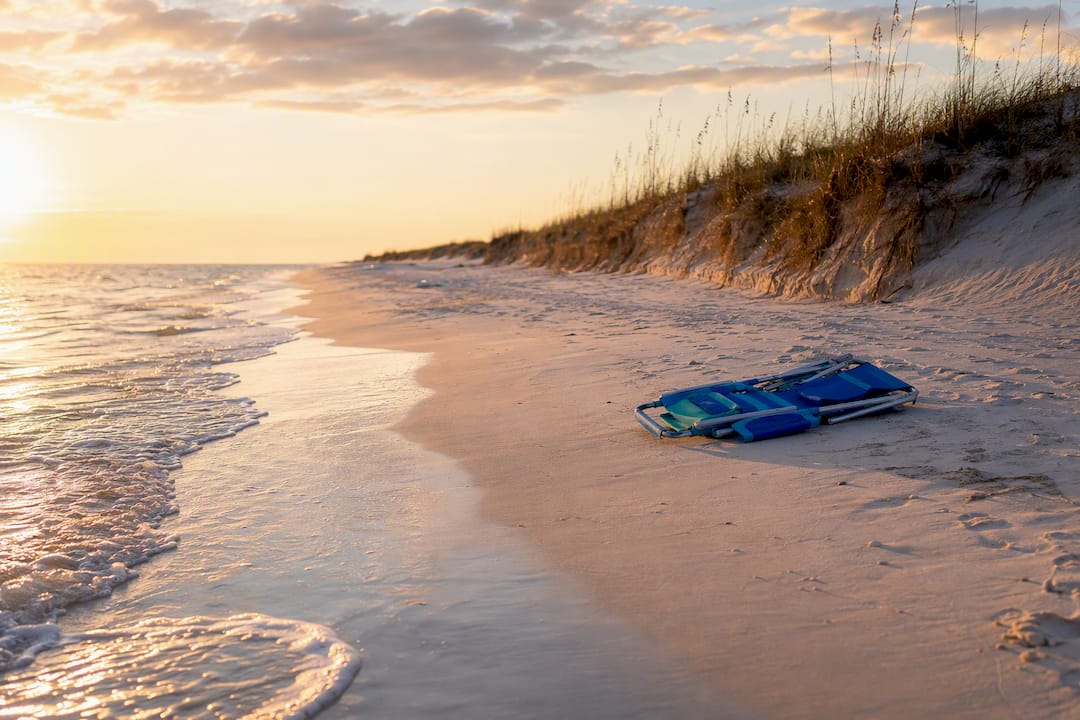 Empty Destin beach with sunrise in winter