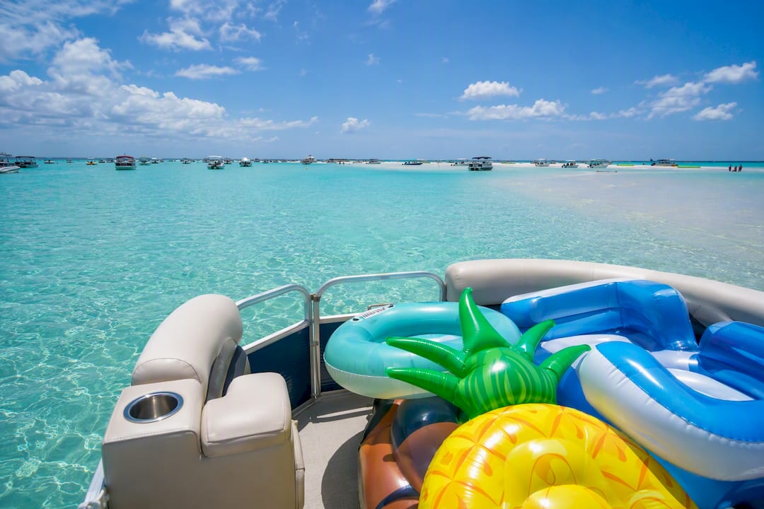 Pontoon boat arriving at Crab Island shallow sandbar