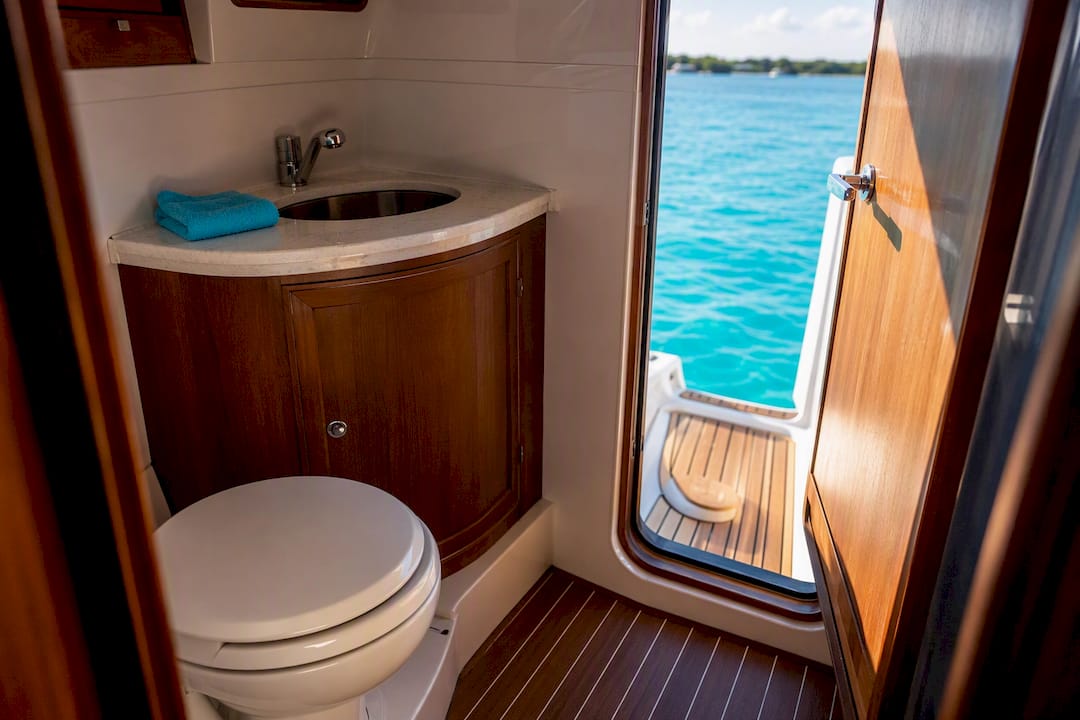 Compact marine restroom aboard tour boat