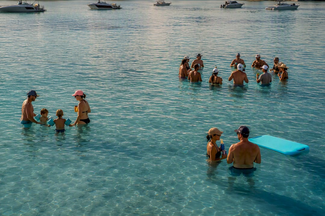 Different visitor groups gathered near Crab Island
