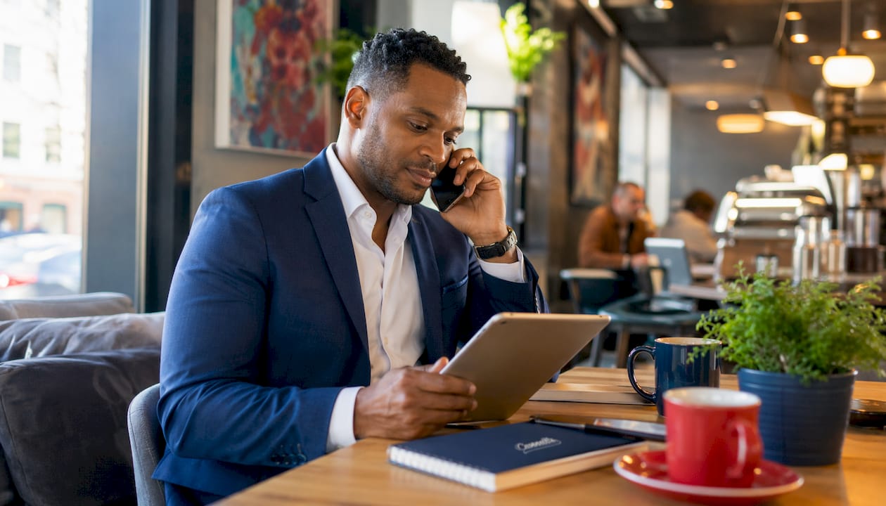 Senior move manager coordinating relocation over phone