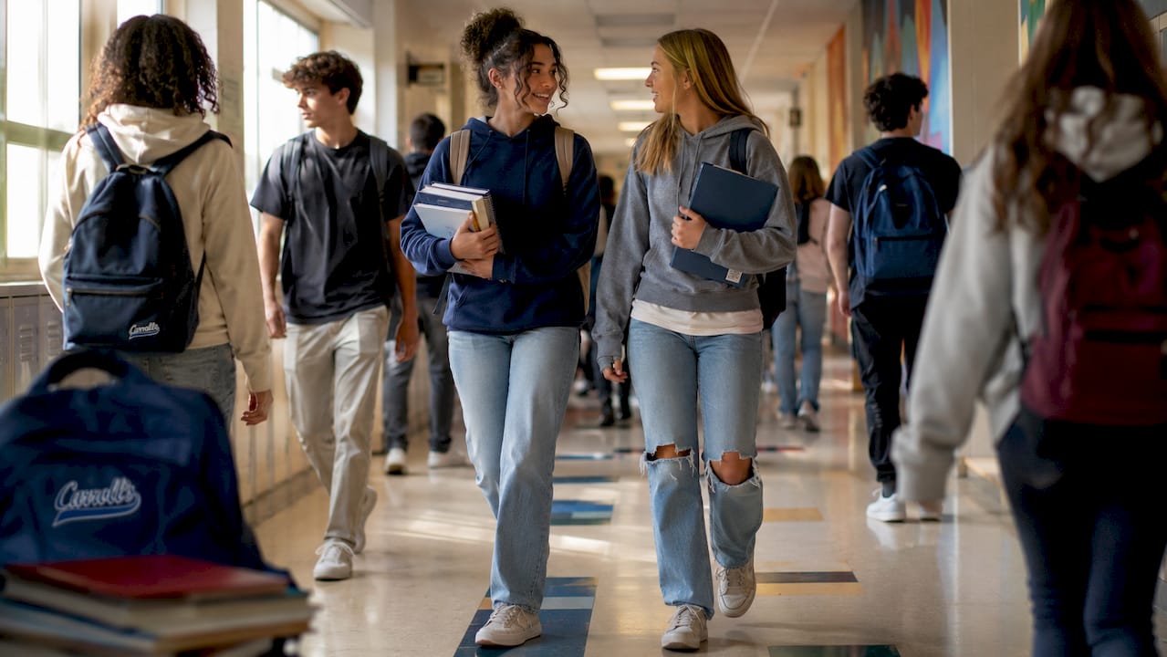 Students walking in Cape Cod high school hallway