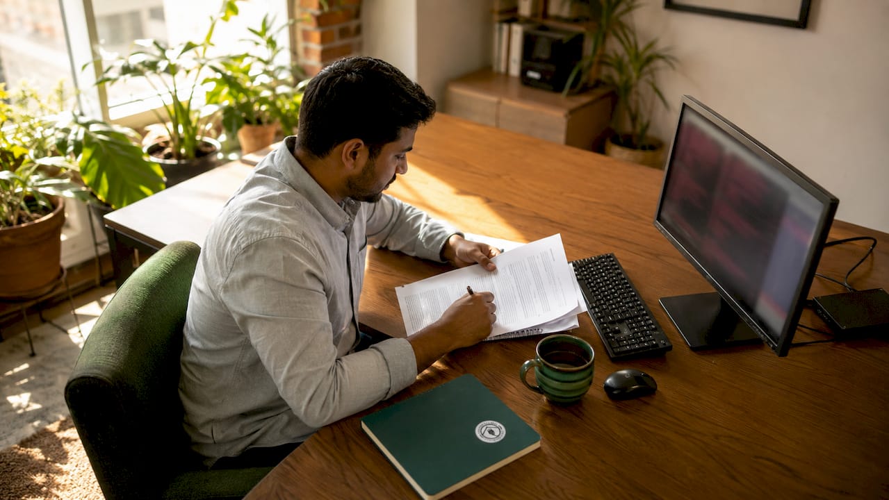 IT technician reviewing security protocols
