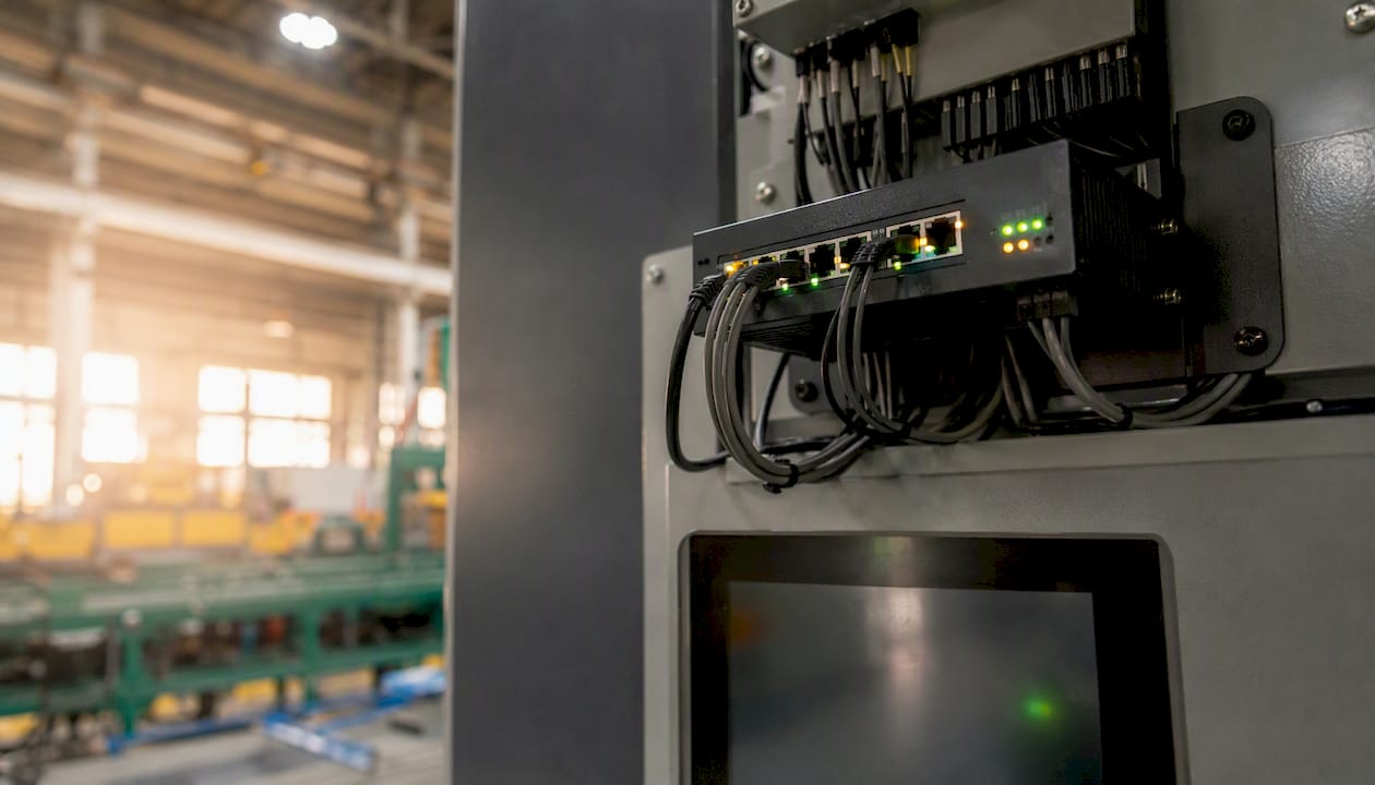 Industrial network monitoring device close-up in factory