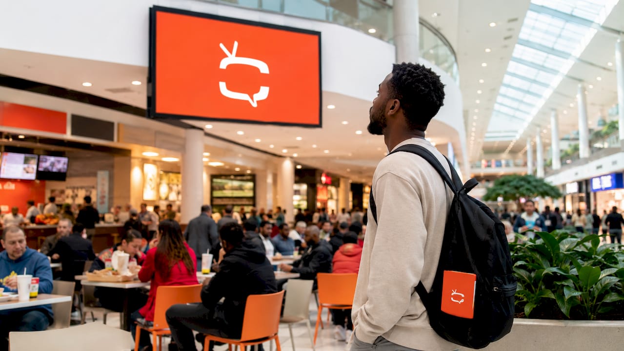 Digital screen placed in high traffic retail area