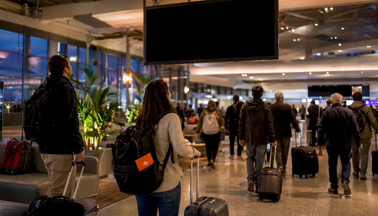 Digital screens in airport transit terminal