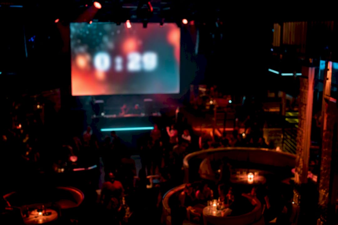 Digital countdown screen in nightclub atmosphere