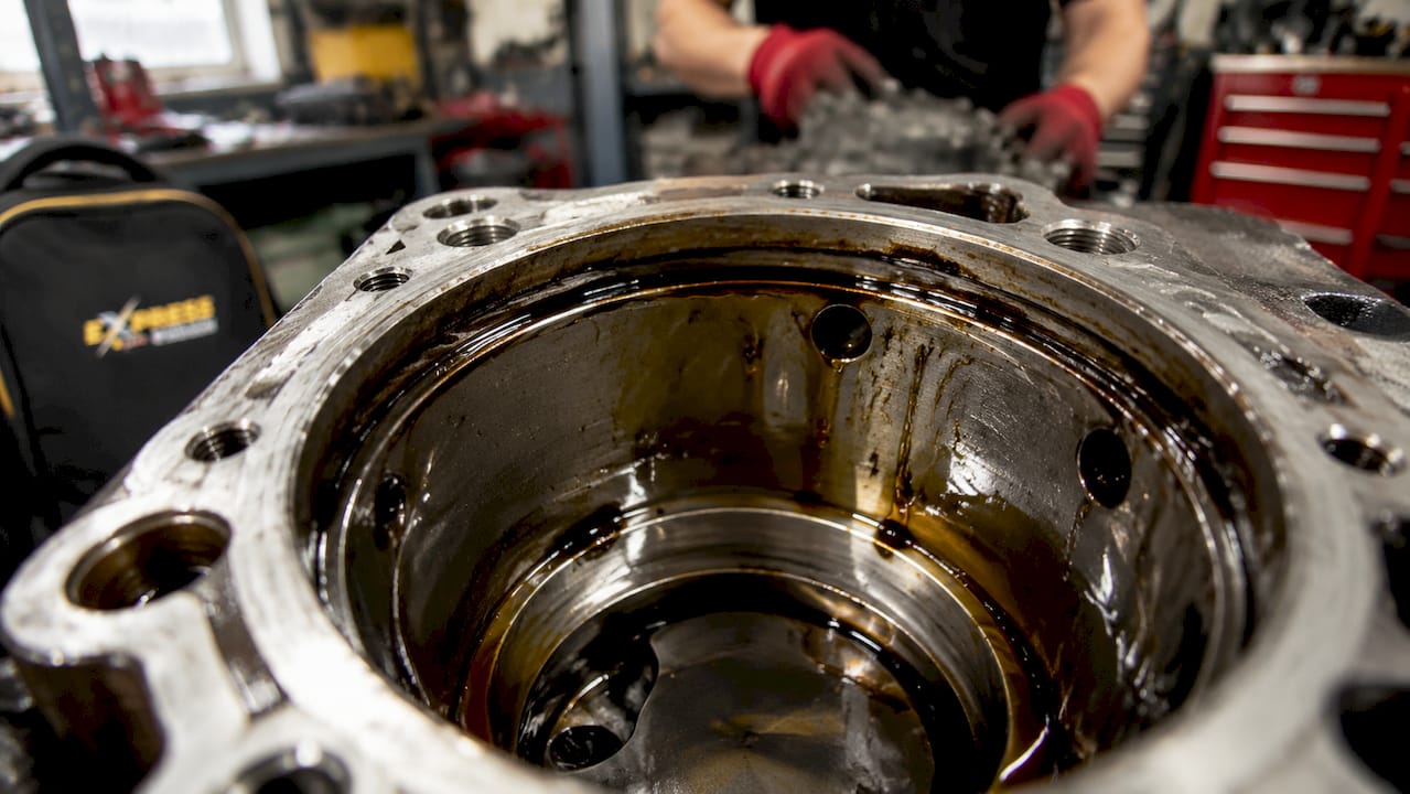 Close-up of lubricating film on engine metal parts