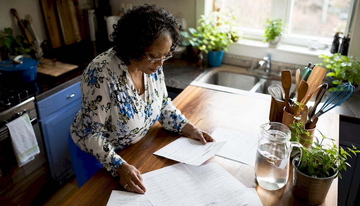 Landlord reviewing tenant background check documents