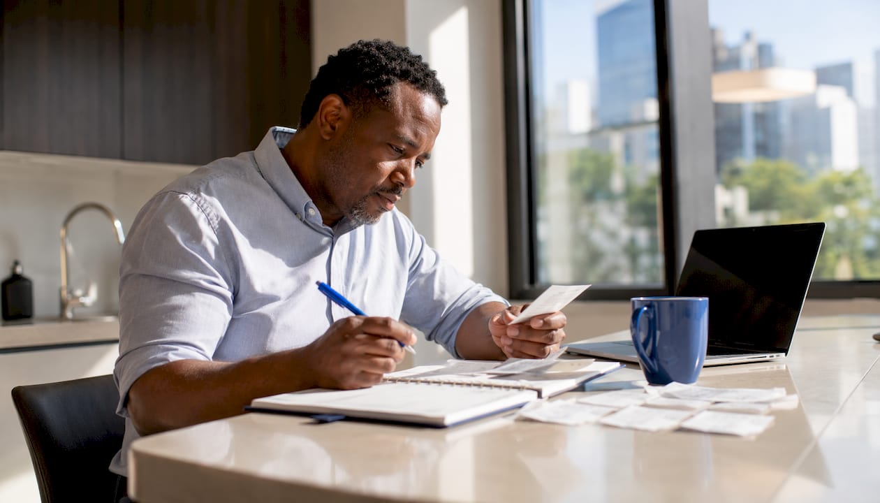 Landlord reviewing rent payment records
