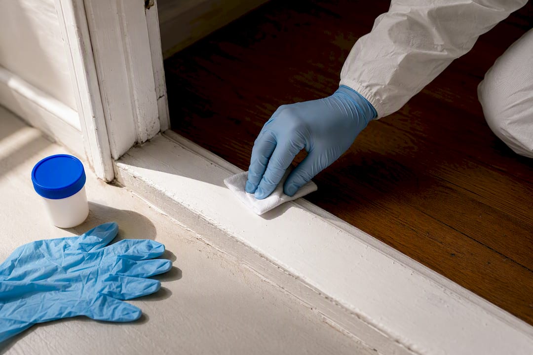 Inspector collecting lead dust sample