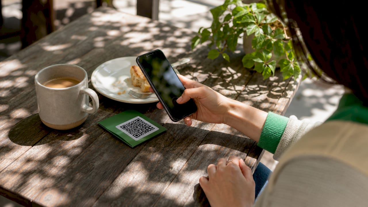 Close-up of smartphone scanning QR code