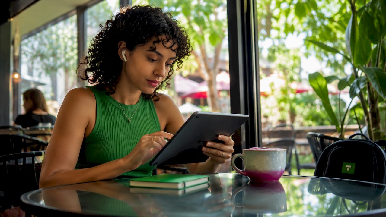 Content creator reviewing tipping data in home office