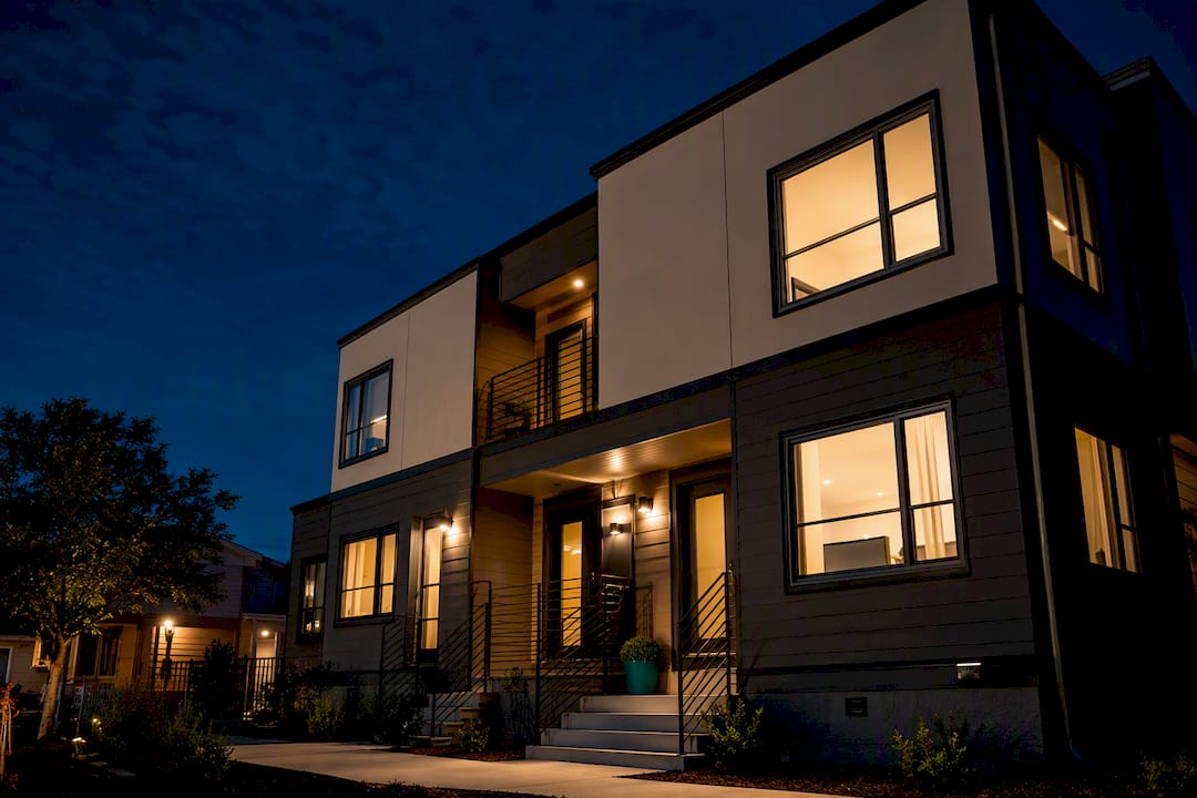Four-unit apartment building at blue hour