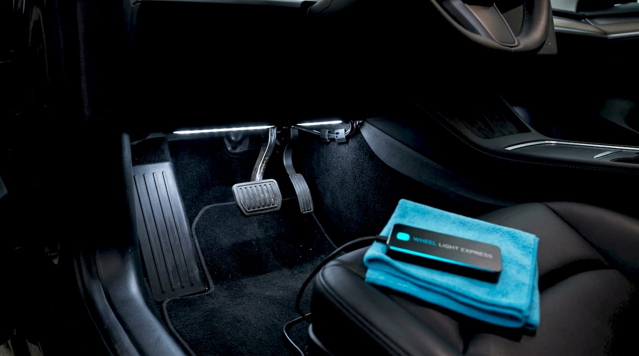 Interior footwell LED strip lighting in car