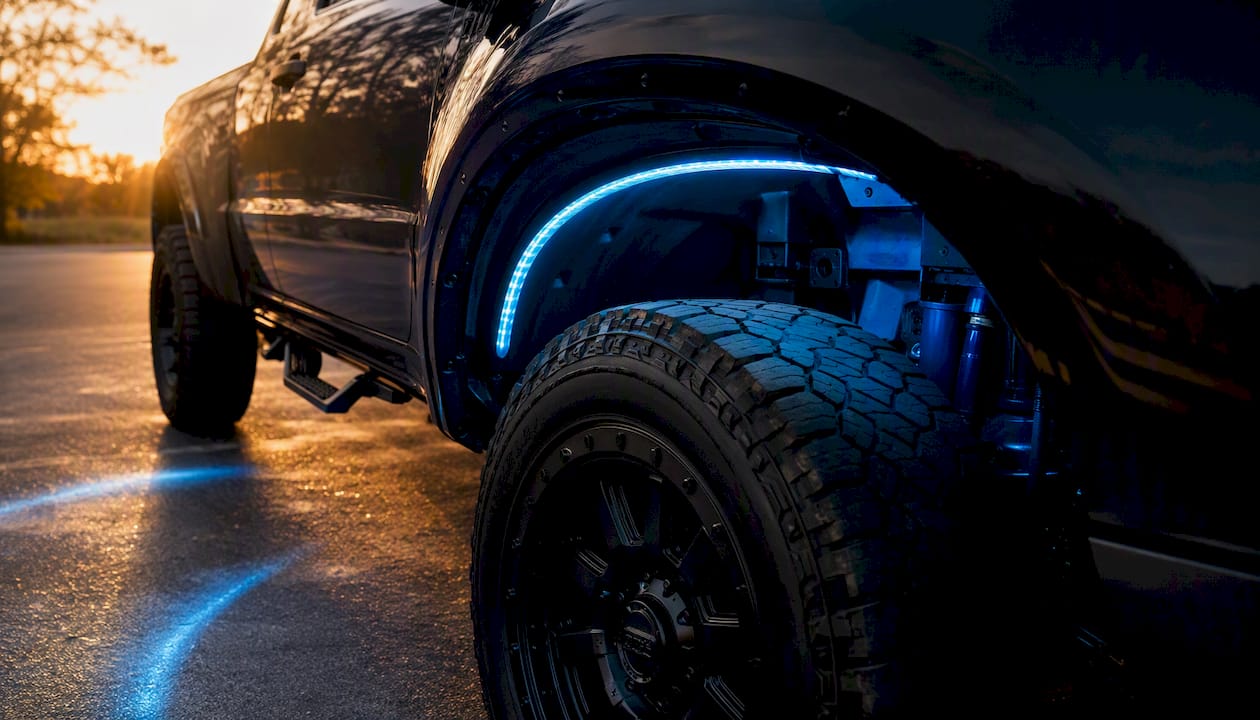 LED strips glowing inside diffused wheel well mount