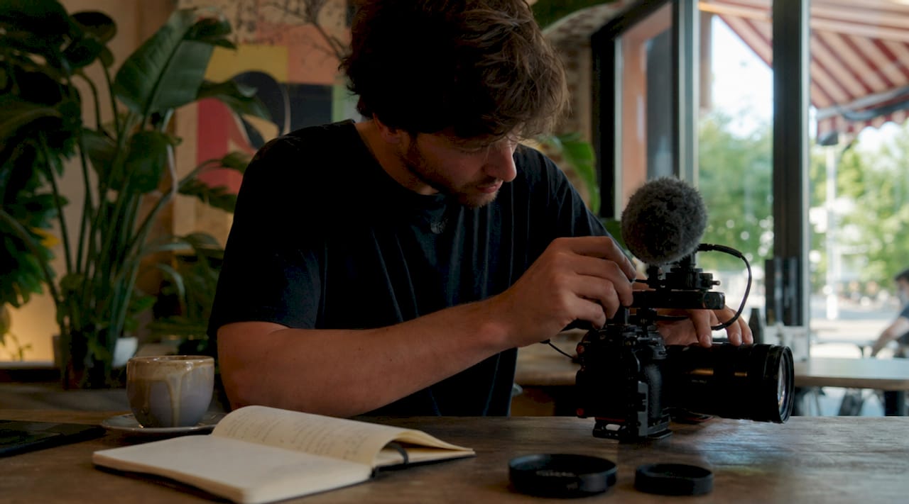 Videographer preparing video series in creative studio