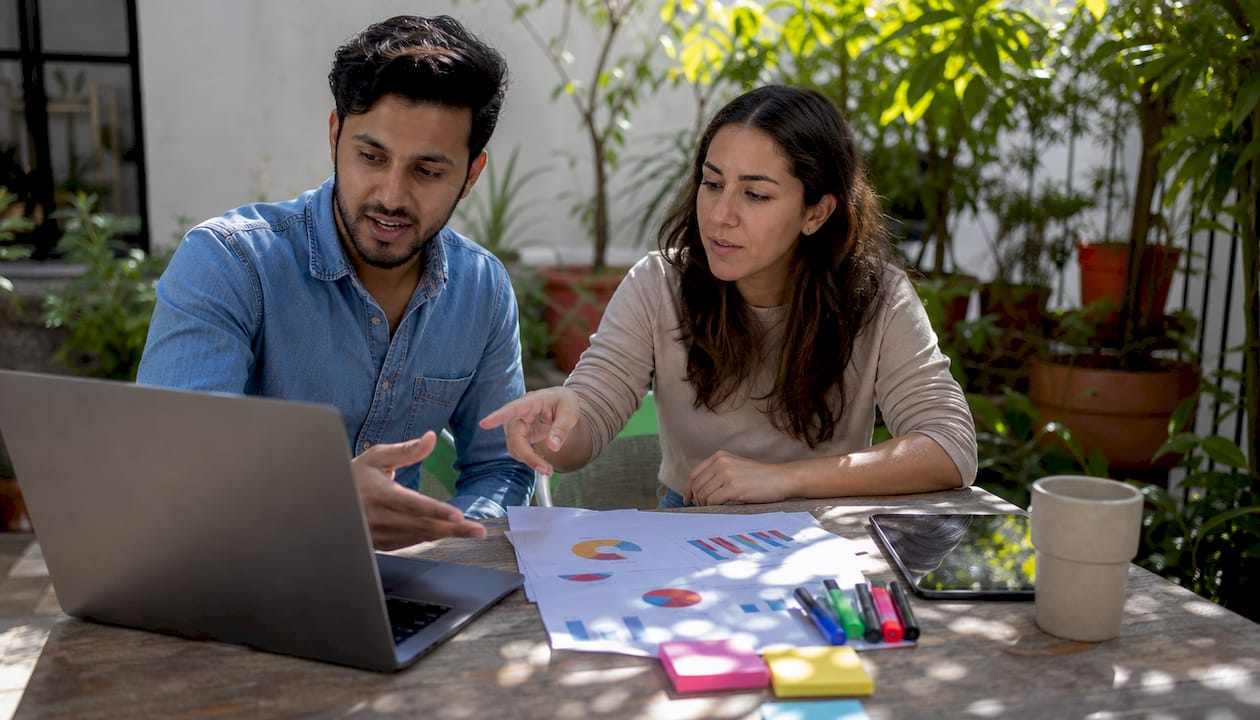 Hands collaborating on ecommerce data syncing
