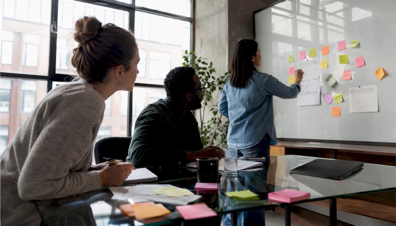 Marketers brainstorming email subject lines