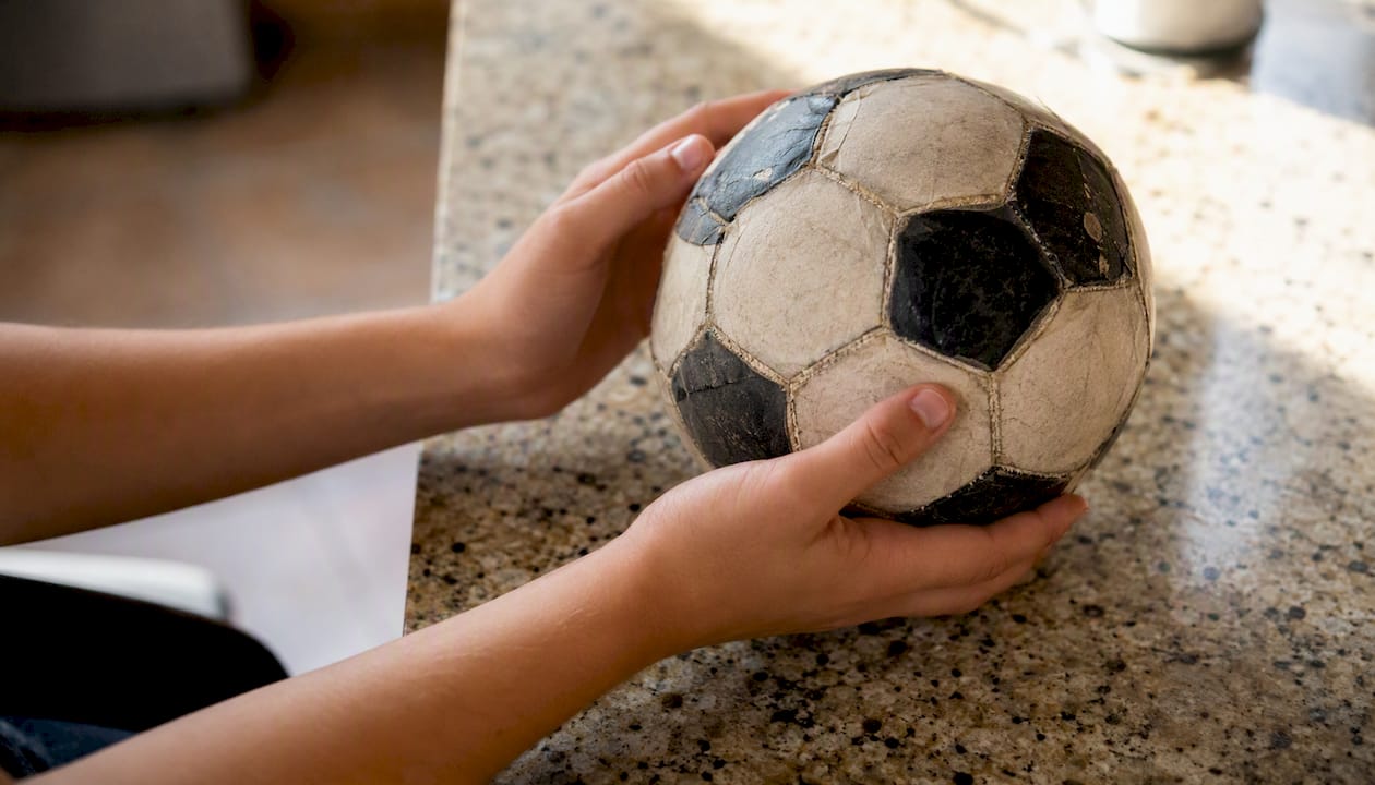 Hands holding meaningful personal object