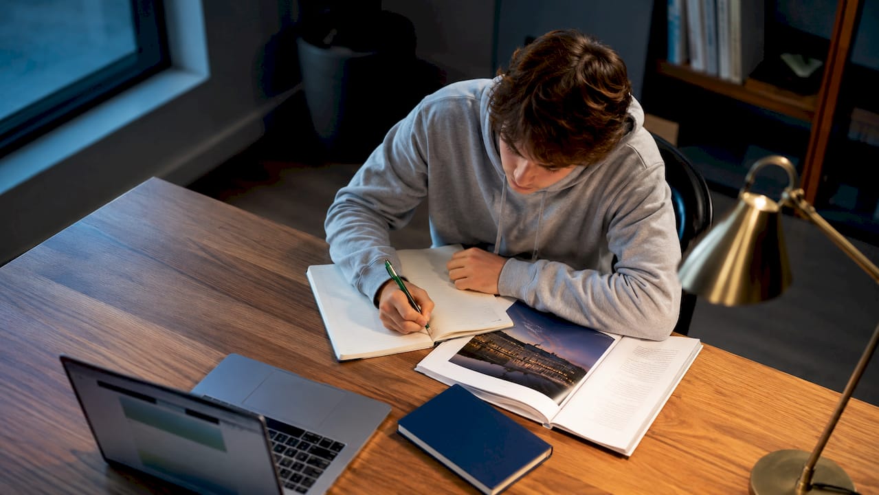 Student researching supplemental essay fit